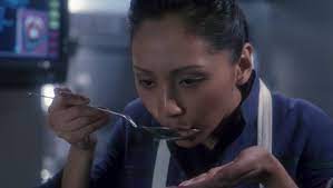 Hoshi Sato sipping soup out of a spoon